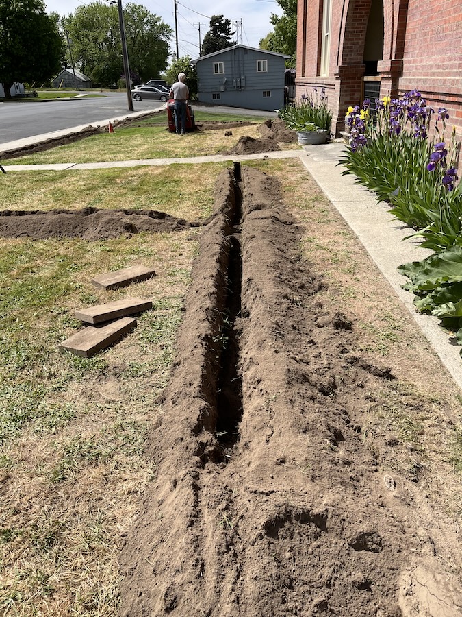 New trenches for the new sprinkler system for the lawn